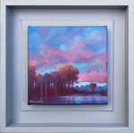 blue and pink sky and distant line of trees against reflected water